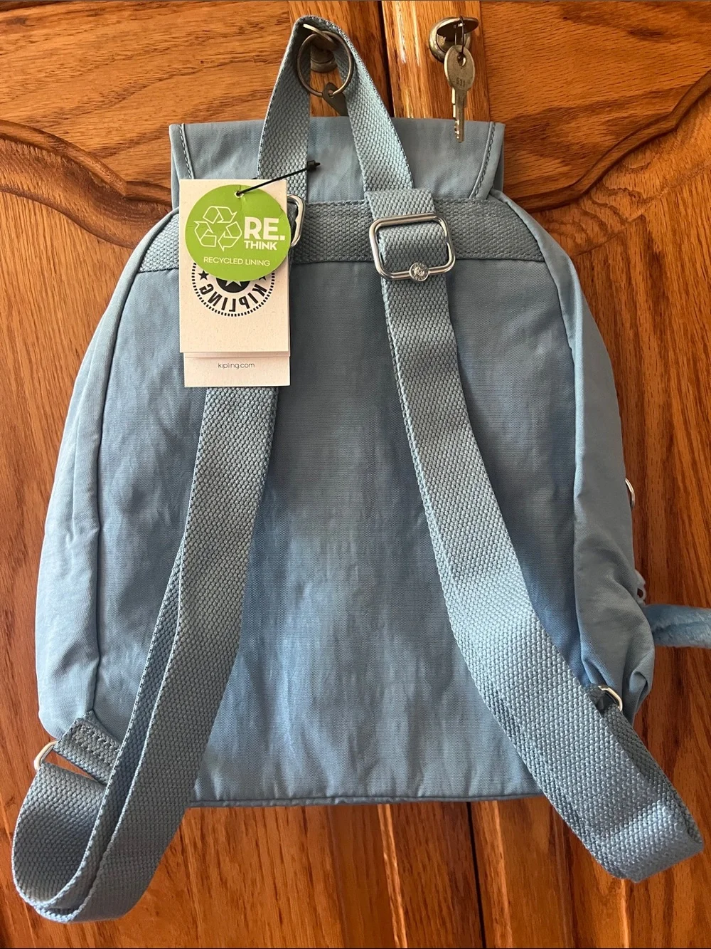 Kipling Dusty Blue Nylon Mini Backpack with monkey bag Charm